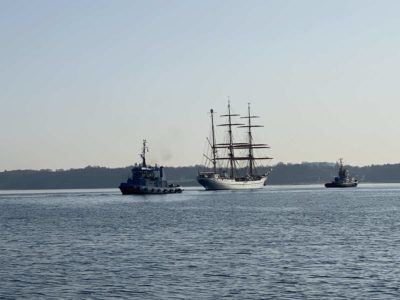 Sail training ship Gorch Fock with two tugs